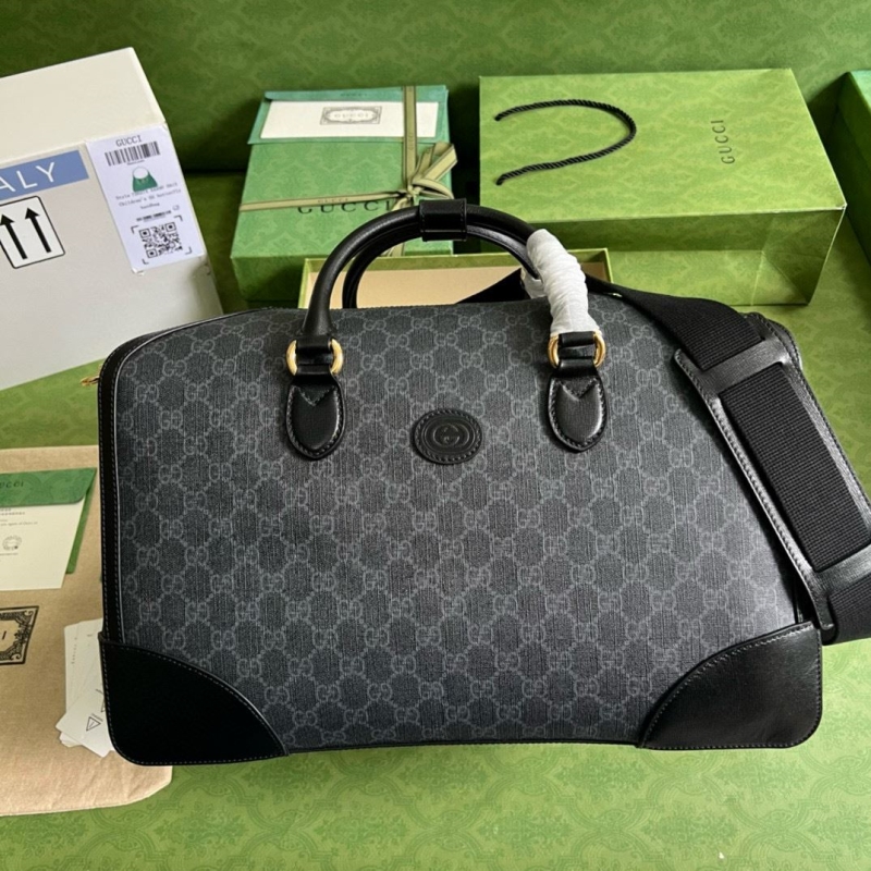 G*u*i top handle bags